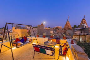 Rooftop swing seat at dusk